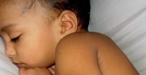 Sleeping child - God made us all unique - Genes, the Oldest Writing in the World