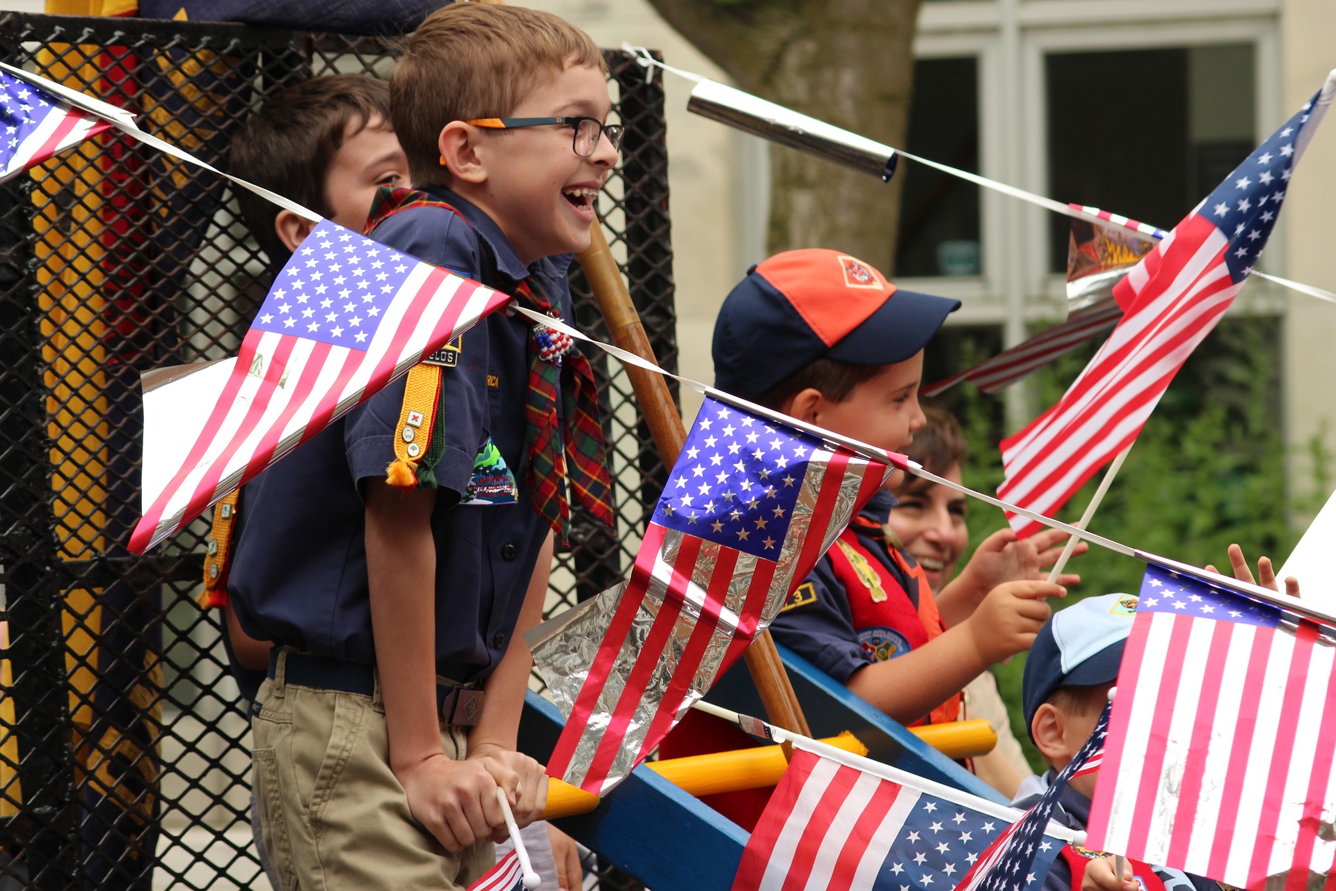 Children celebrating US holiday with American flags